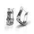 Pair of silver hoop earrings with intricate designs 