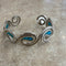 Silver bracelet with blue stones 