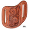 Brown leather holster with intricate designs 