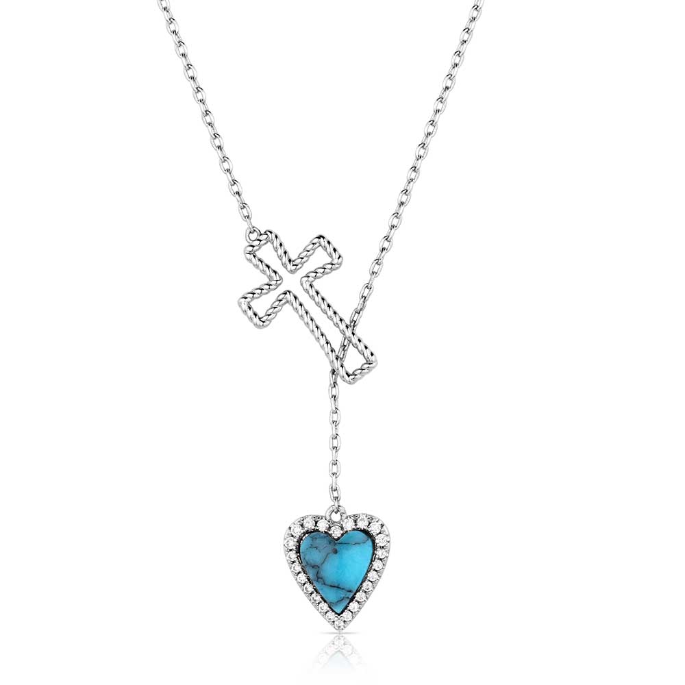 Necklace with a turquoise heart pendant and cross 