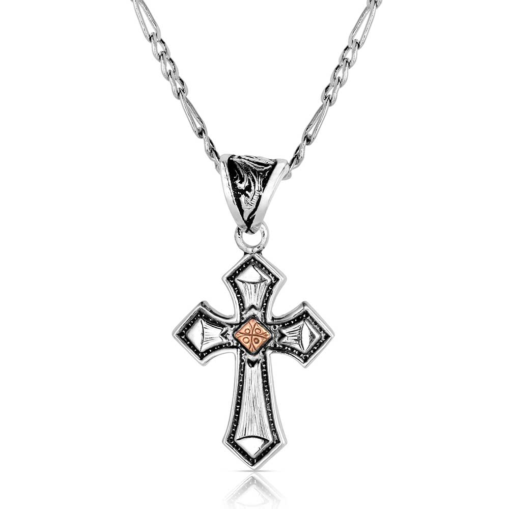 Silver cross pendant necklace on a white background