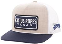 Trucker hat with 'Cactus Ropes Texas' logo on a beige and navy background