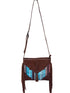 Brown leather bag with colorful striped pattern 