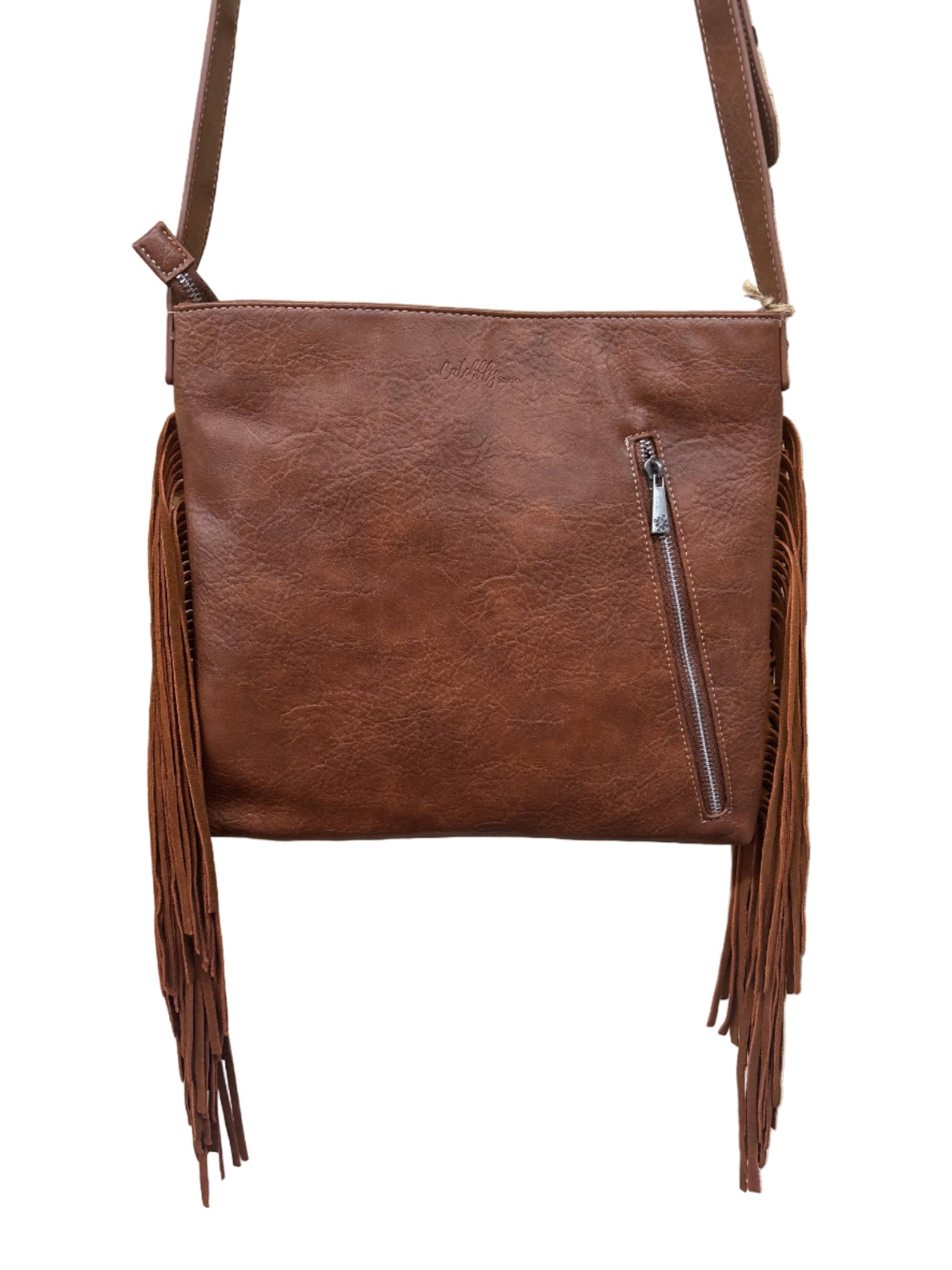 Brown leather bag with fringe on a wooden surface