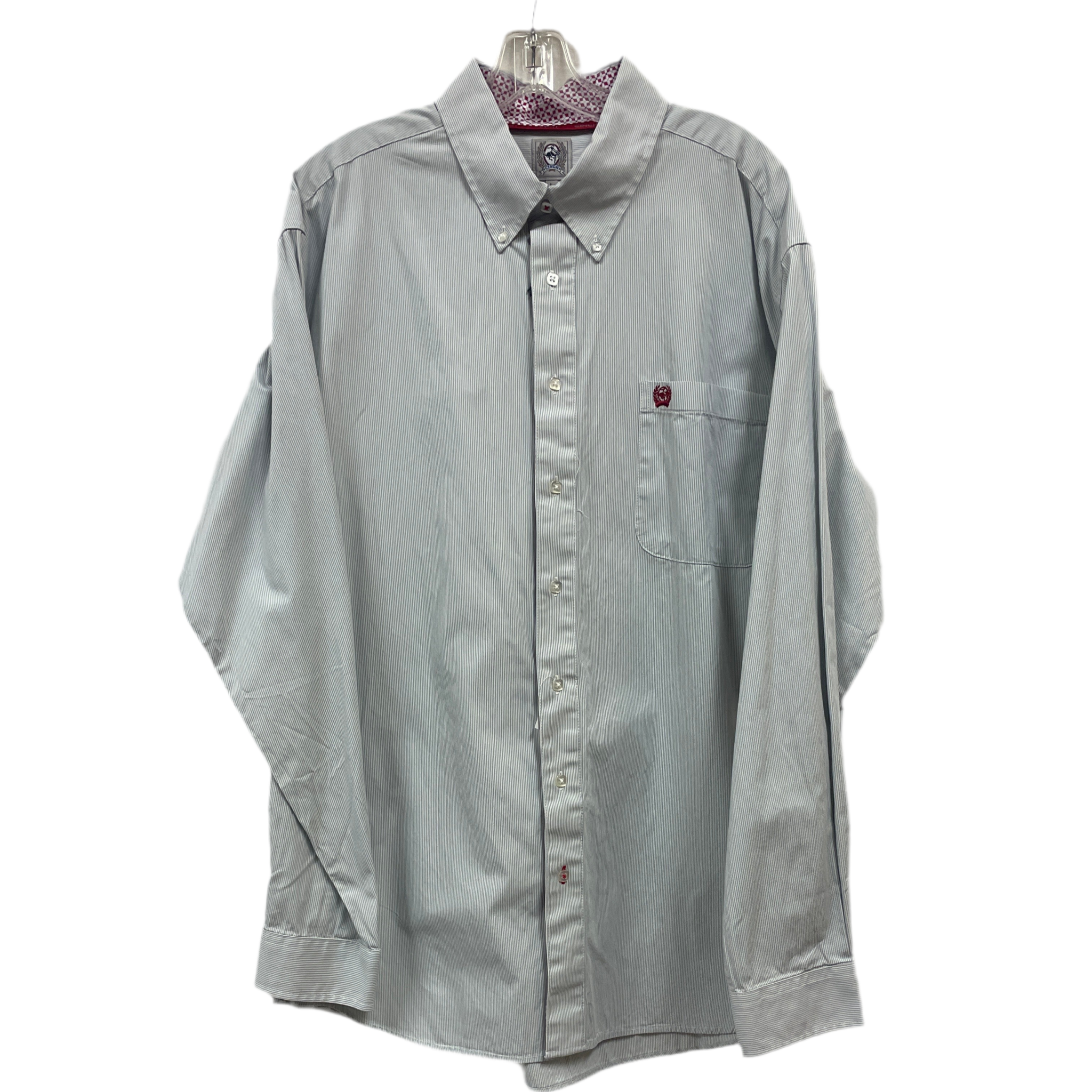 A long-sleeved striped shirt with a collar, button-up front