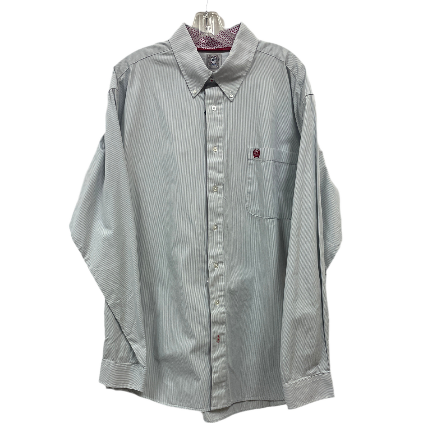 A long-sleeved striped shirt with a collar, button-up front