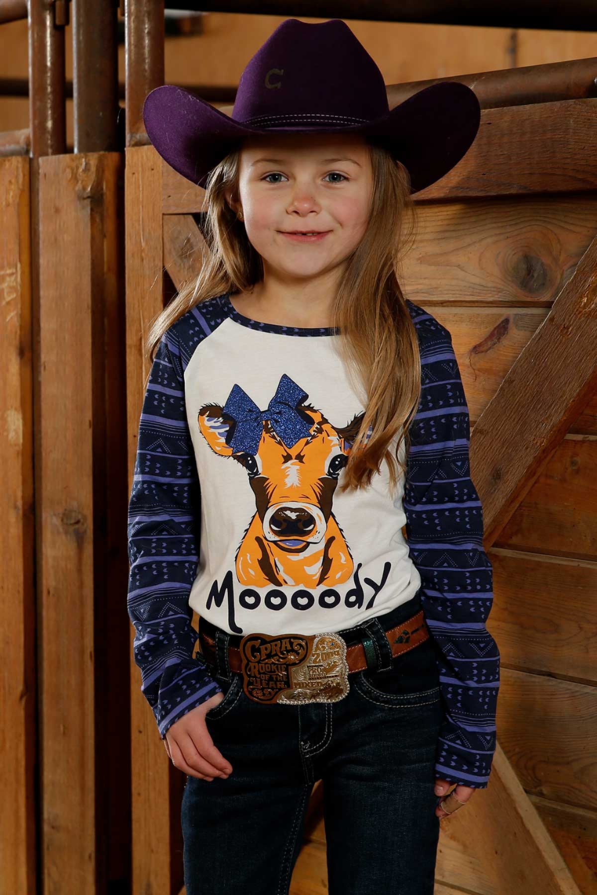 long-sleeve shirt with a cow design and 'Moody' text