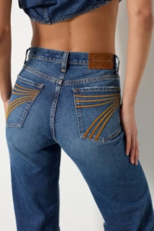 Ladies dojo blue jeans with stitched 7 on the back pocket