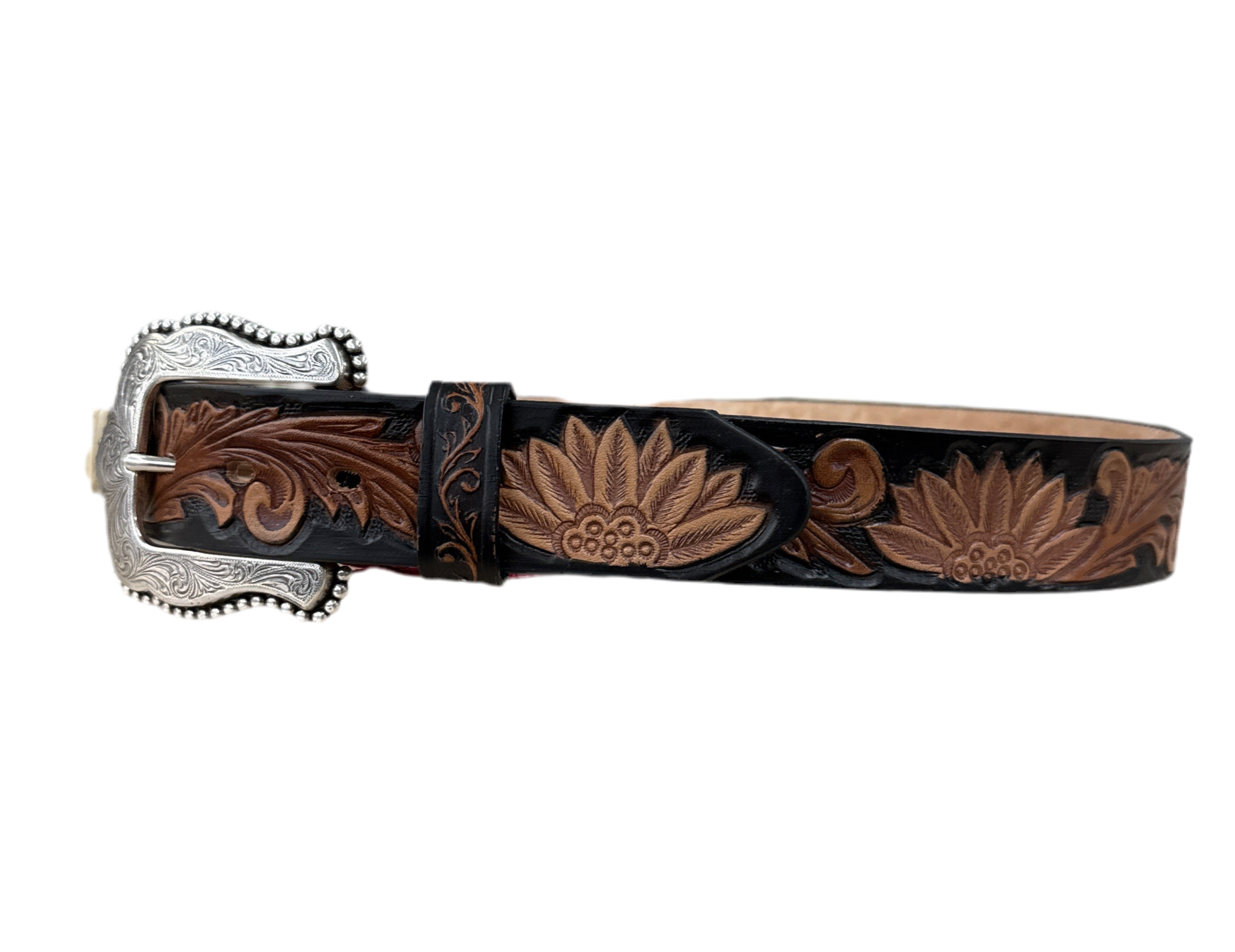 A leather belt with a floral pattern and a silver-plated buckle.
