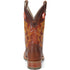 Brown cowboy boot with intricate design on a white background