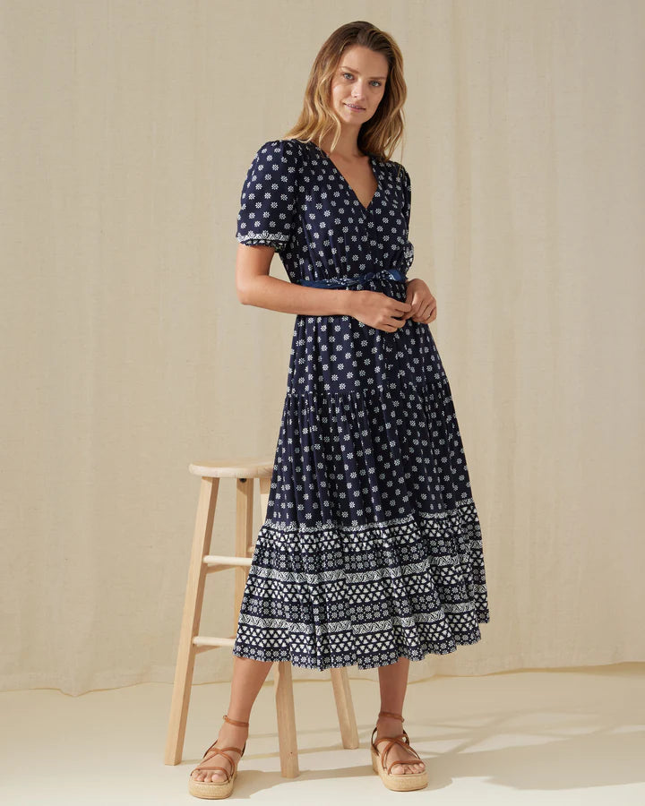 navy dress with white patterns and button down front