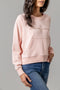 Kimes women’s pink cropped crewneck sweatshirt