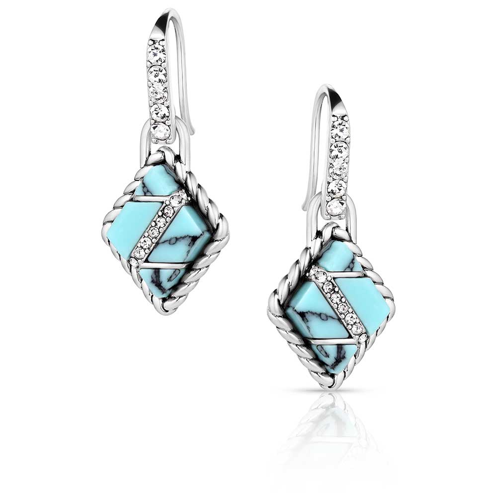 A pair of silver-colored earrings featuring turquoise accents, designed in a geometric pattern.