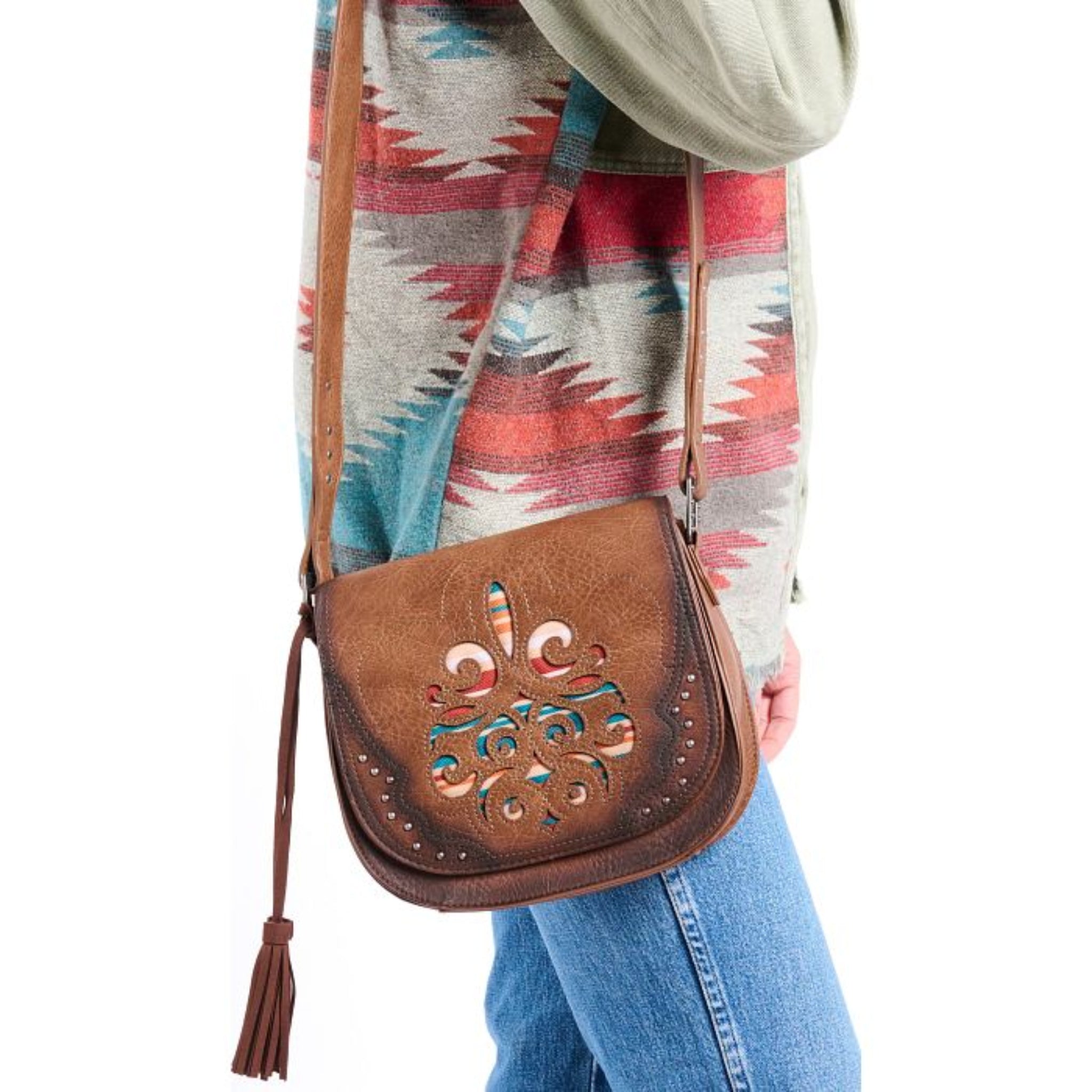 Brown leather crossbody bag with decorative cutout design 