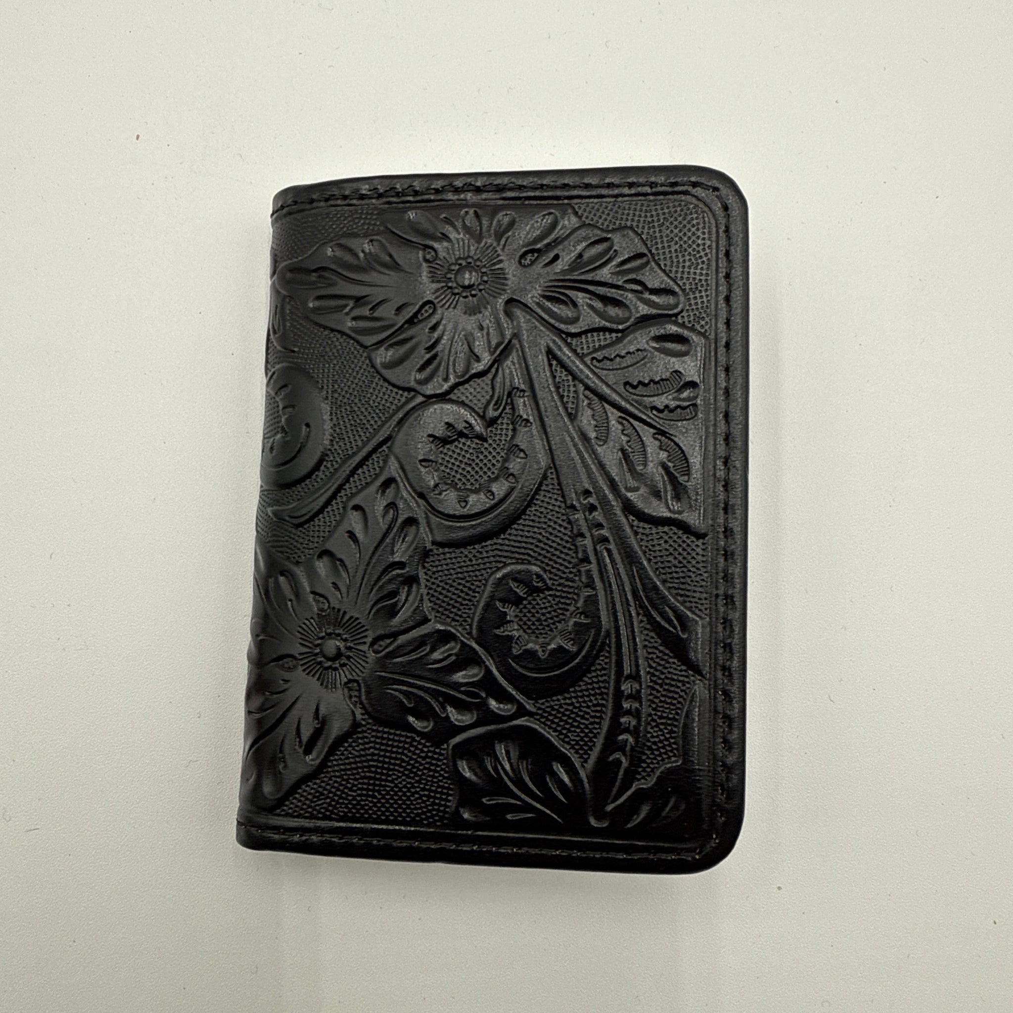 Black leather wallet with floral embossing 