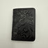 Black leather wallet with floral embossing 