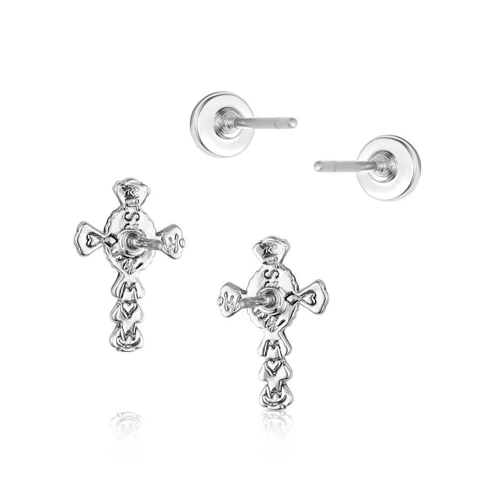 Pair of silver cross-shaped earrings on a white background