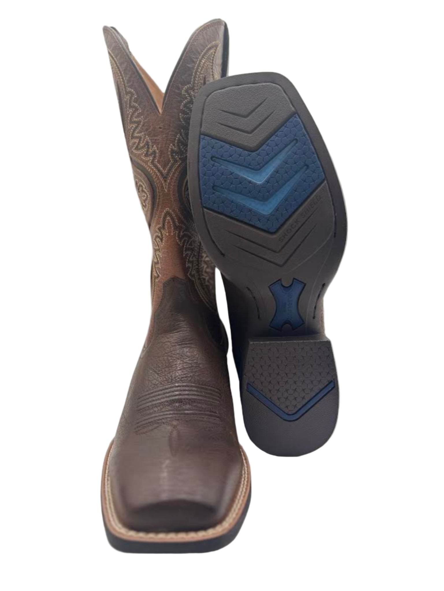 Brown cowboy boots with blue shock shield sole