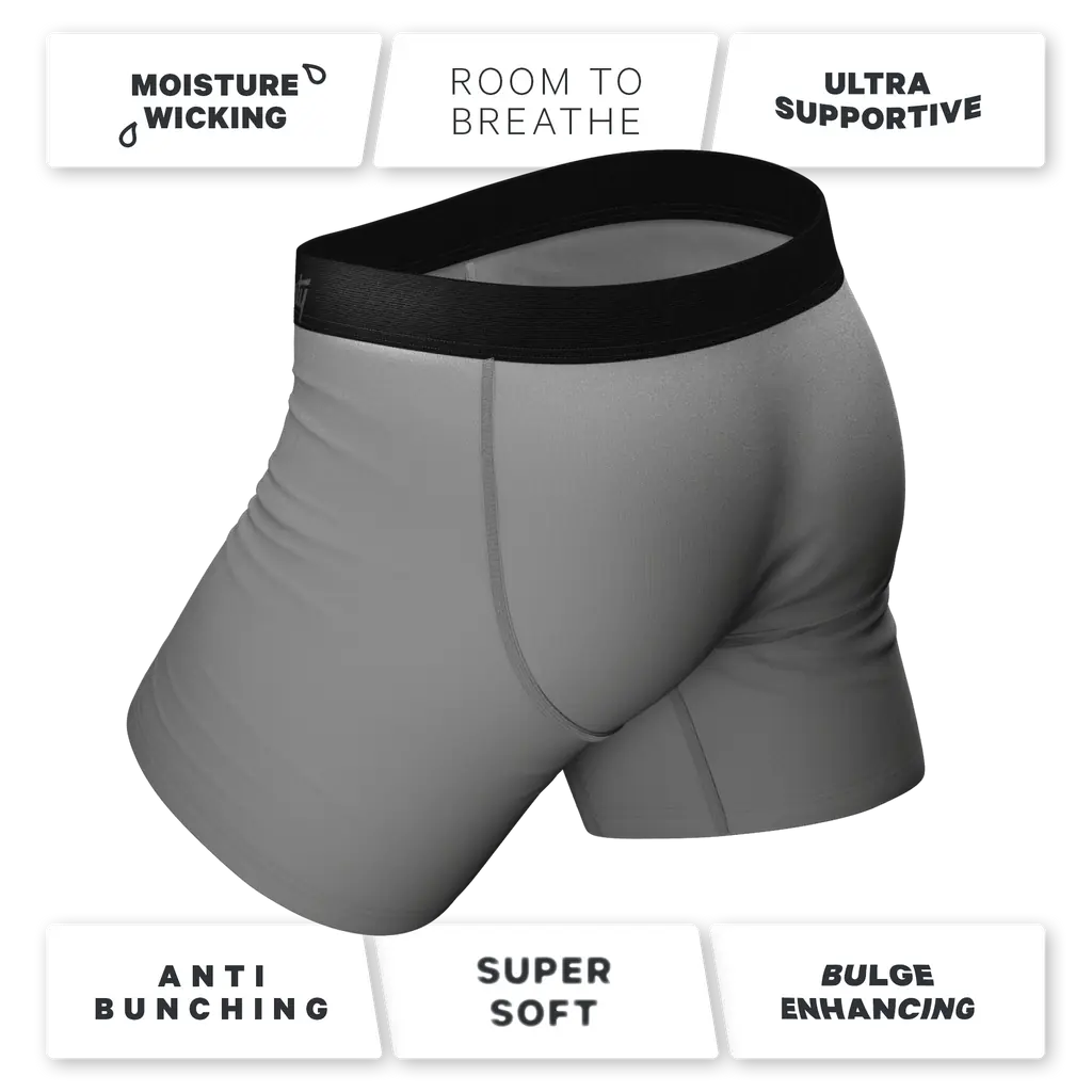 Gray boxer briefs with black waistband on a white background with feature text.