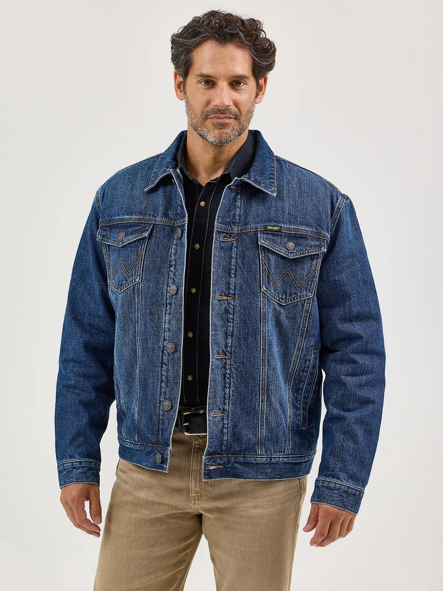 Man wearing a blue denim jacket 
