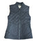 Black quilted vest with zipper front and front pockets.  Inside is lined with a inside zipper chest pocket