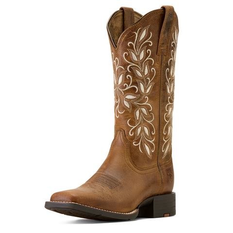 Brown cowboy boot with intricate white embroidery 