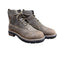 Pair of brown lace up work boots with steel toe