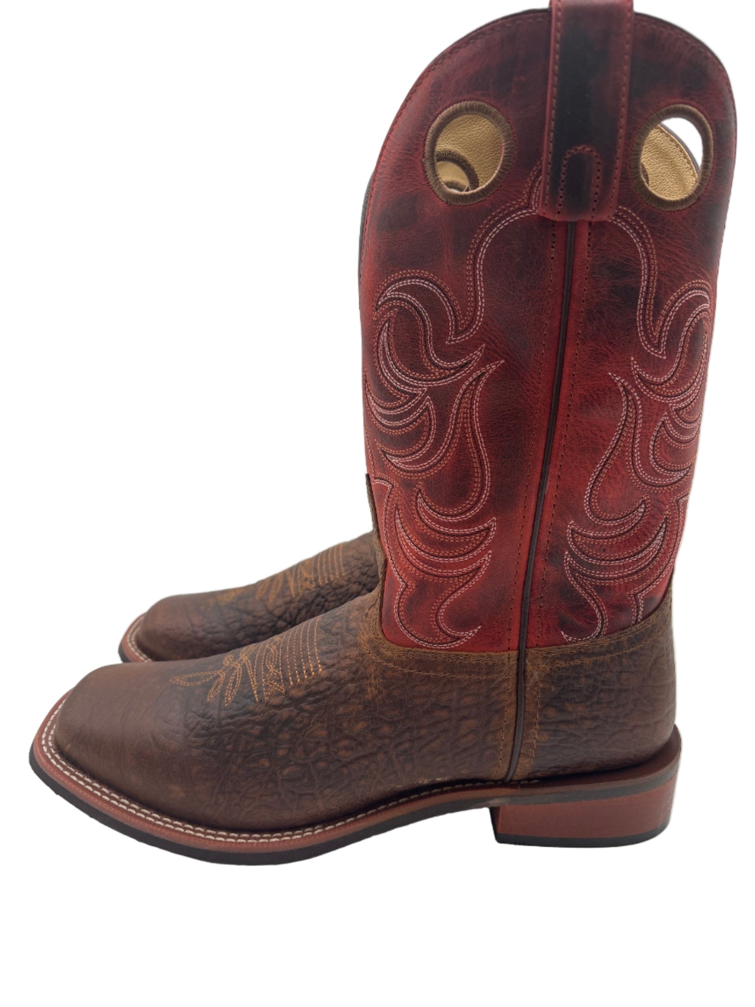 Brown leather boot with intricate stitching 