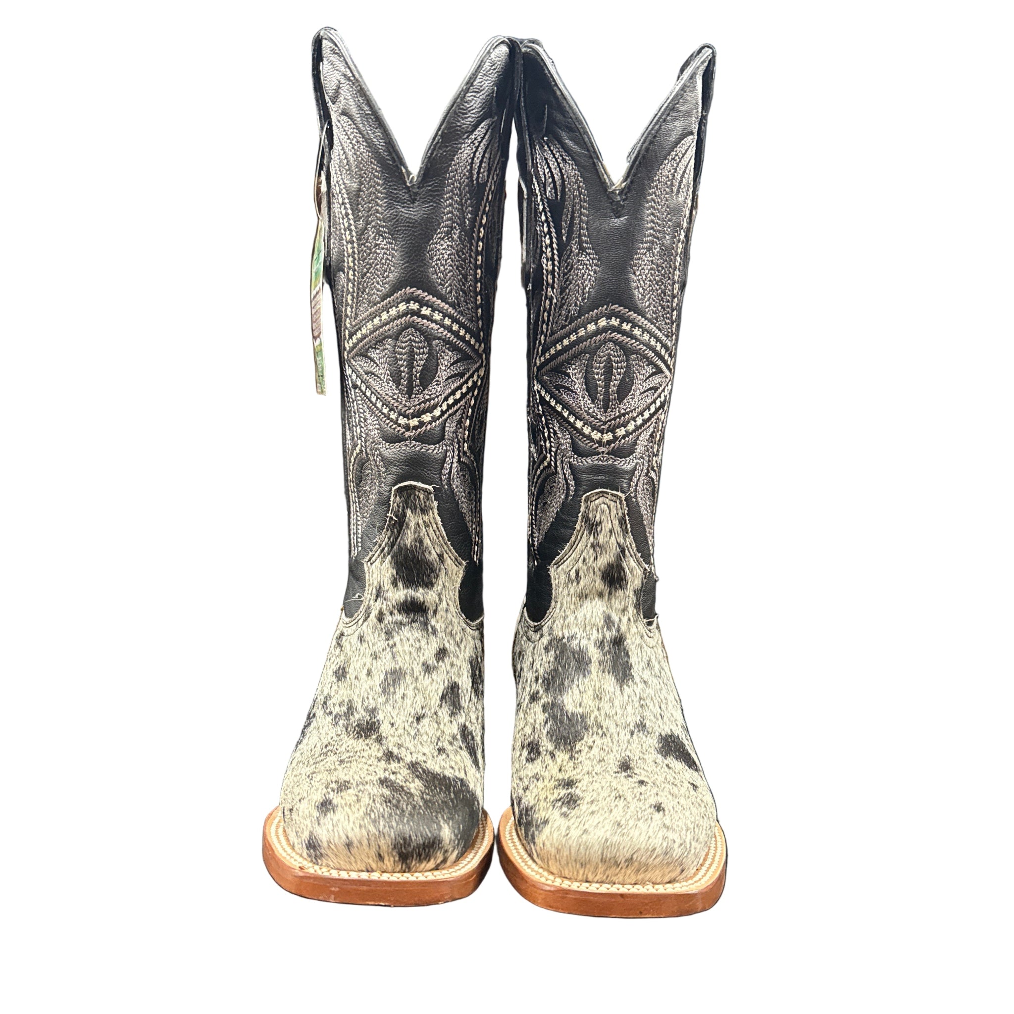 Pair of black and white cowhide boots