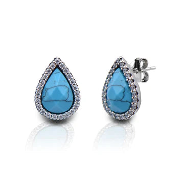 Teardrop-shaped turquoise earrings with silver settings