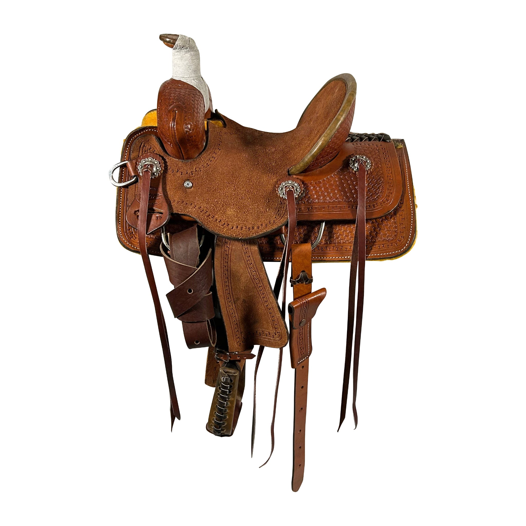 A brown Vickers Classic Youth Saddle with tooling and rigging details, roughout seat and fenders and long strings.