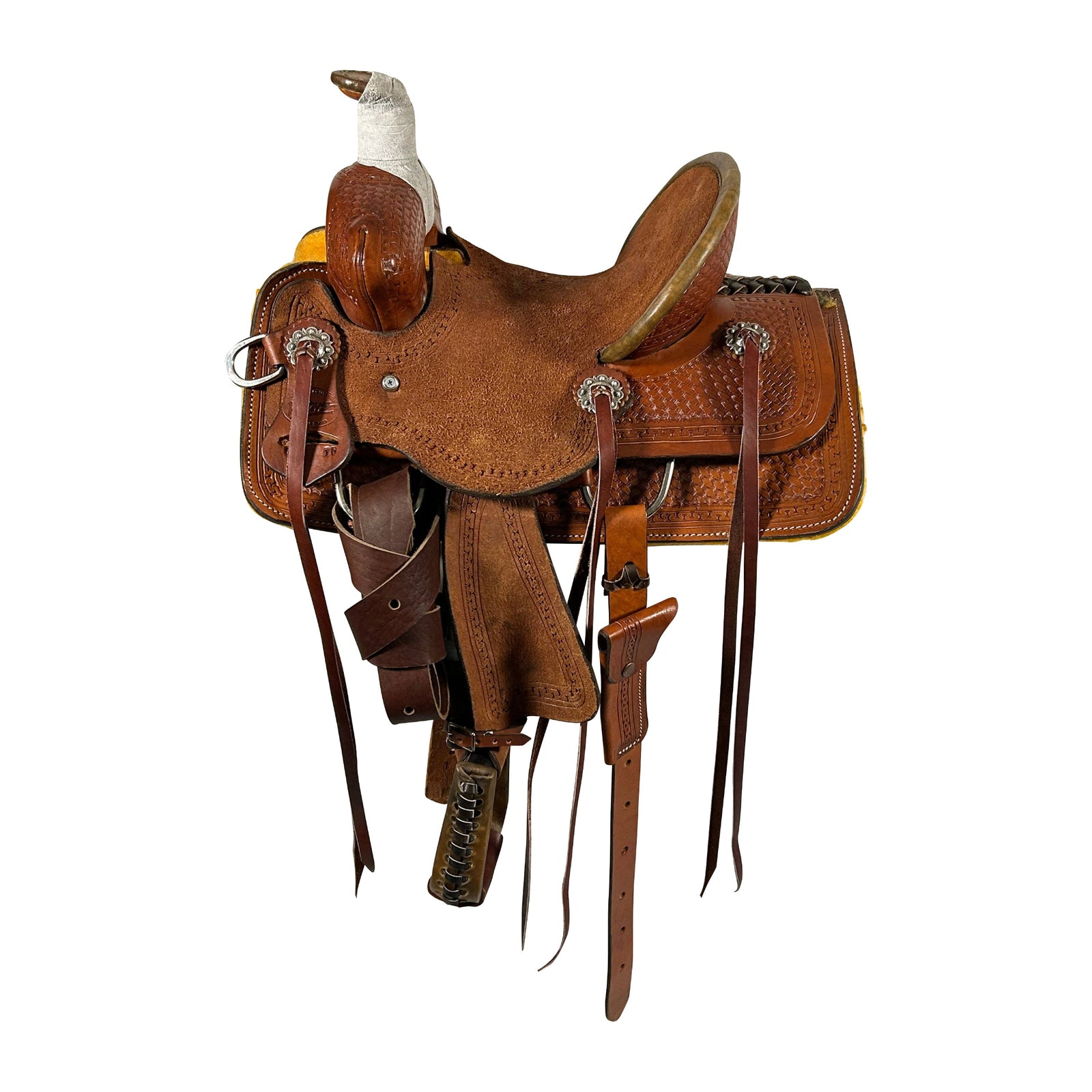 A brown Vickers Classic Youth Saddle with tooling and rigging details, roughout seat and fenders and long strings.