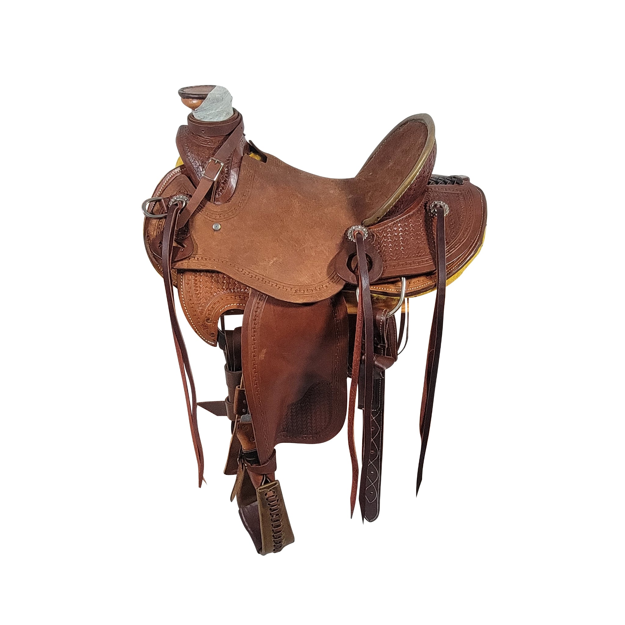 A brown Vickers Classic #145 512 Wade saddle with a roughout seat, stirrups, and 7" gullet