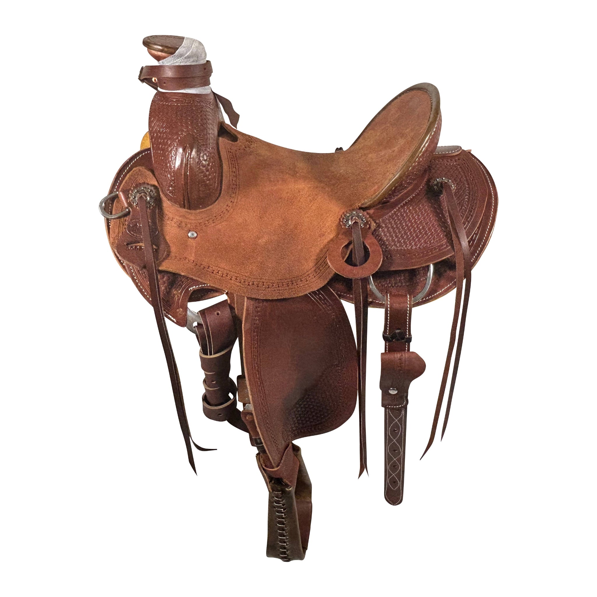 Vickers Classic 5502 Modified Association Saddle with roughout seat, 5" pencil roll cantle, ornate oval basket tooling, round skirt, tip grain fenders, bull hide tree, medium oil finish, and 7" Gullet 