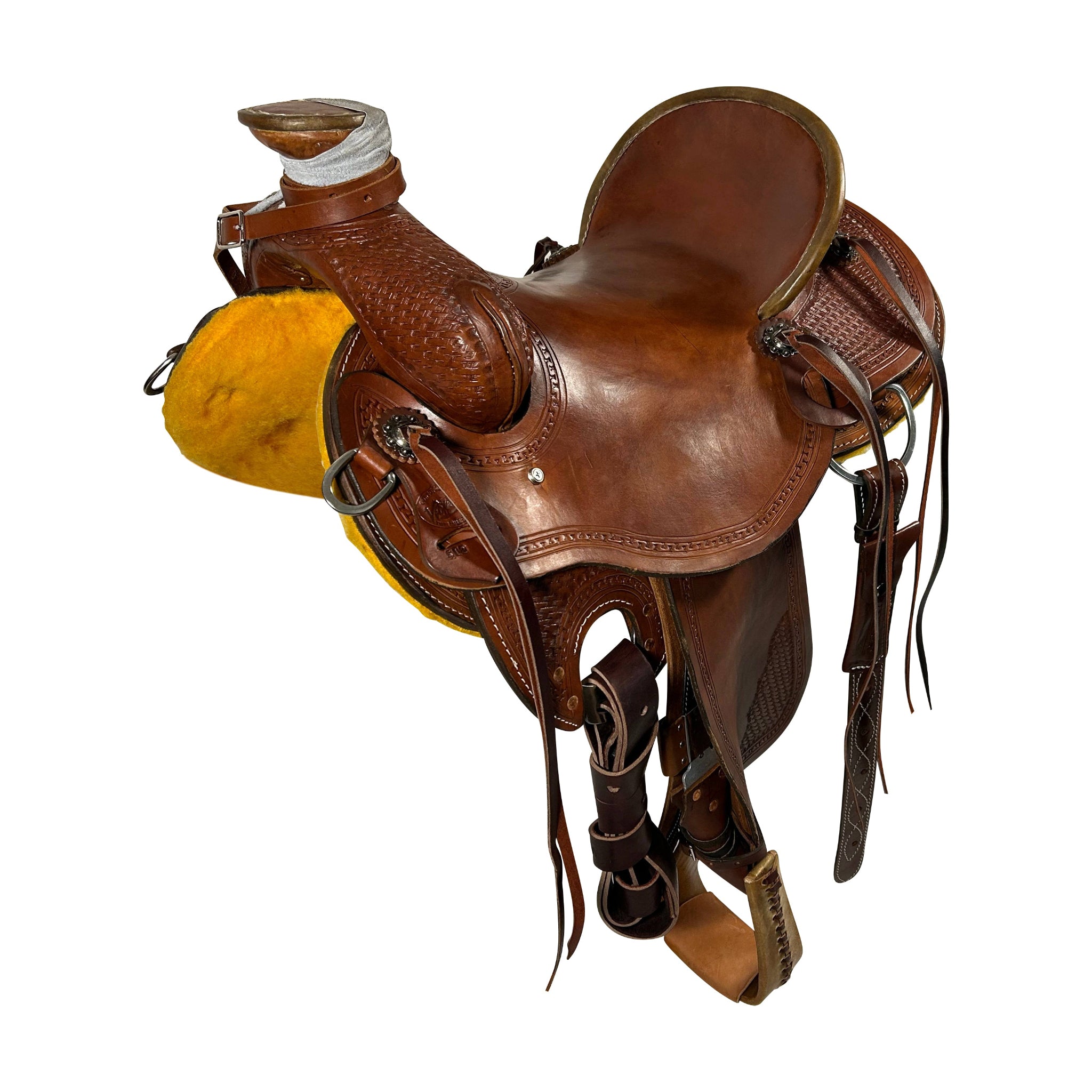 A Vickers Classic 626R Will James Ranch Saddle with top grain seat, medium oil finish, and various equipage including stirrups.