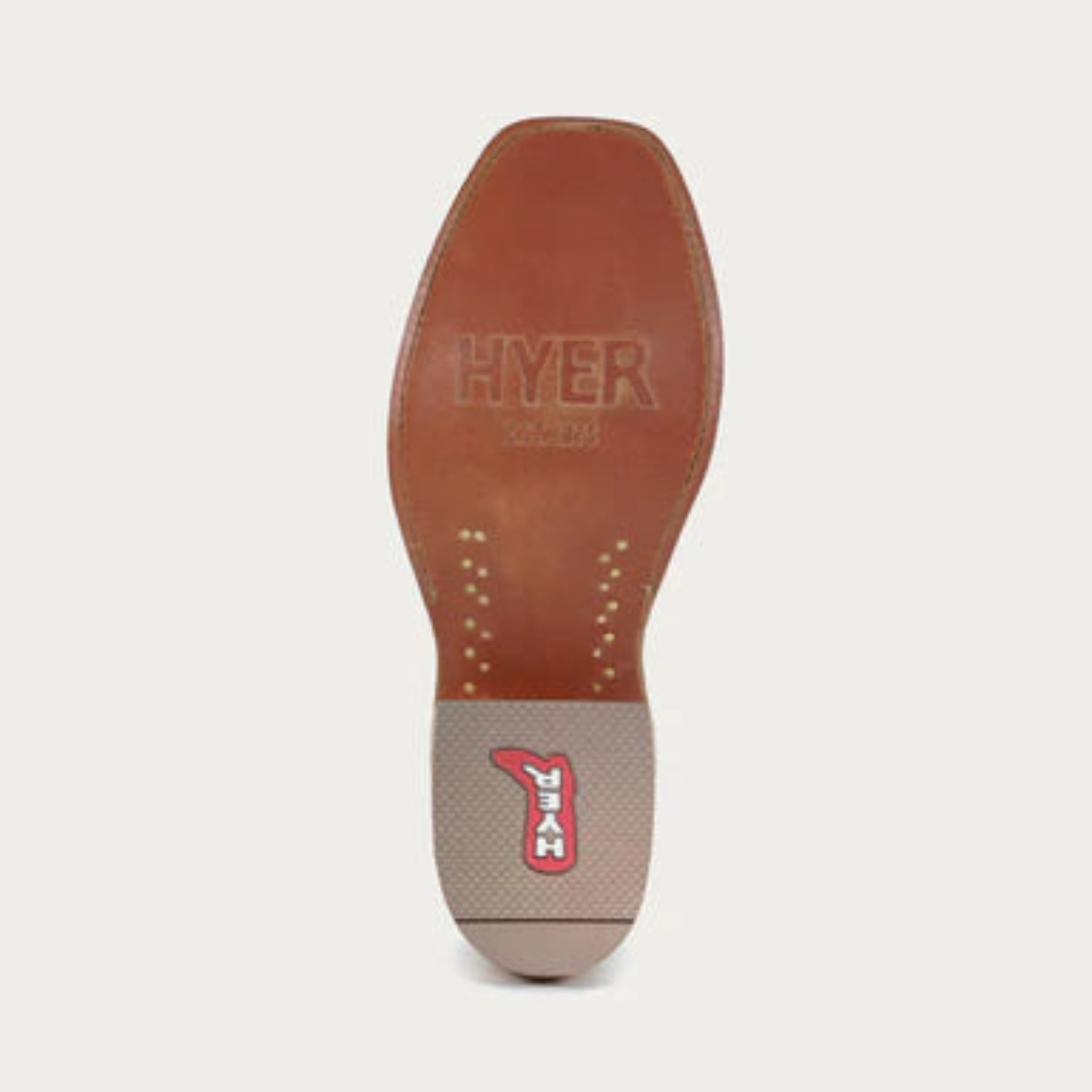 Close-up of a shoe sole with 'HYER' branding on a white background