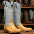 Pair of cowboy boots with detailed design 