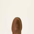 Brown leather boot on a beige background