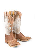 Pair of brown cowboy boots with cross on toe 