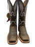 Pair of green cowboy boots with white embroidery on a white background