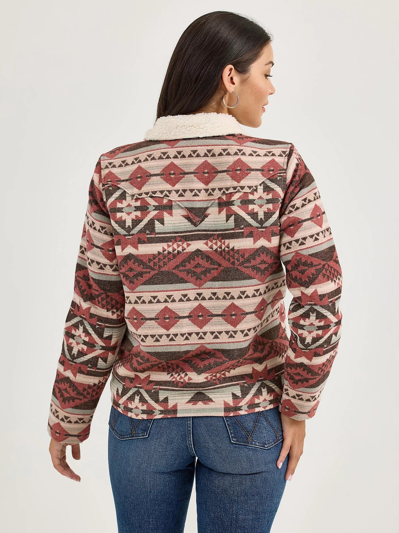 Woman wearing a patterned jacket