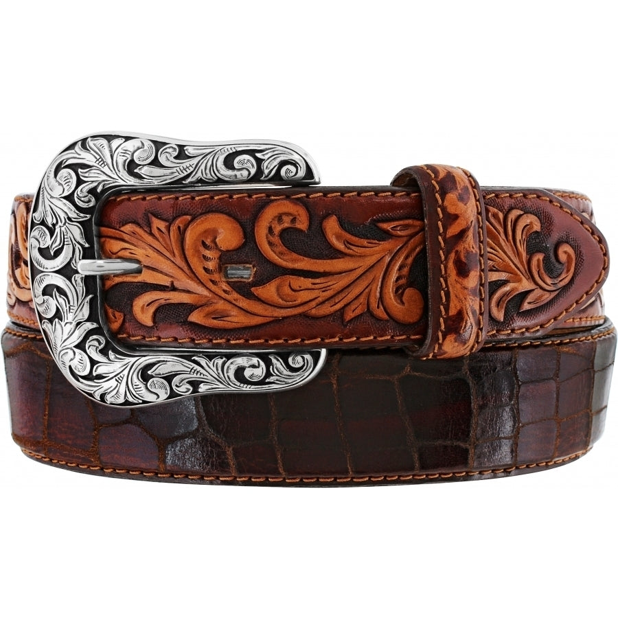 Brown leather belt with intricate silver buckle